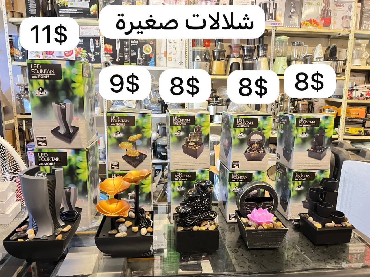 شلال ديكور صغير بإضاءة LED وحصى